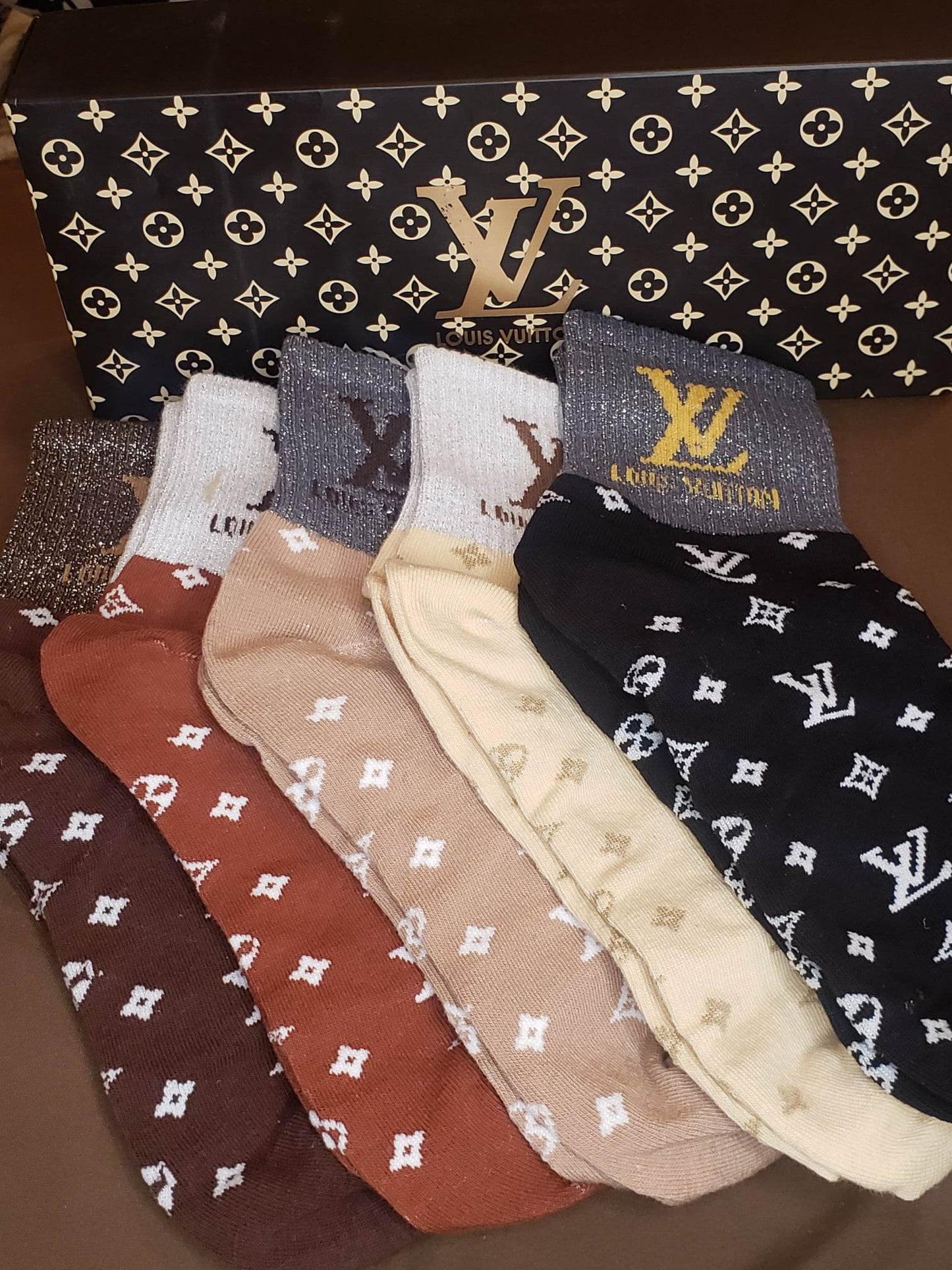 LOUIS VUITTON ONE BOX AND FIVE PAIRS HIGH LENGTH SOCKS